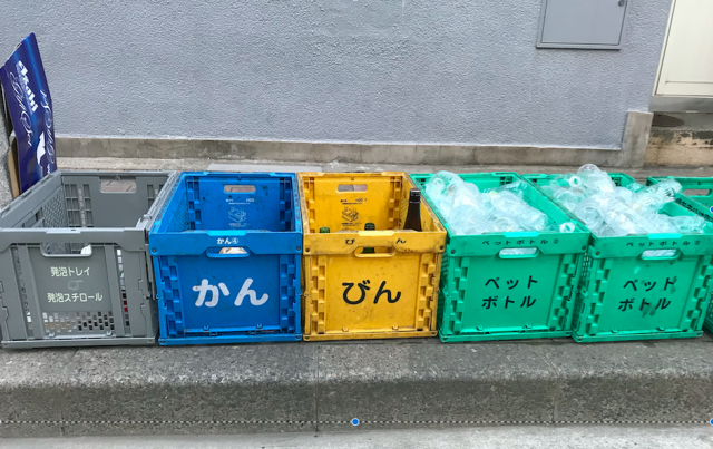 sorting garbage in japan - boxes for different garbage