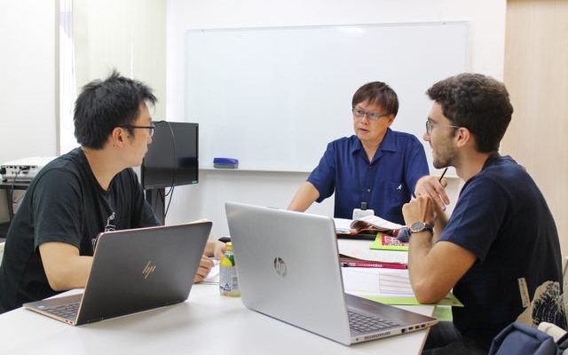 Japanese teacher teaching Japanese to the students